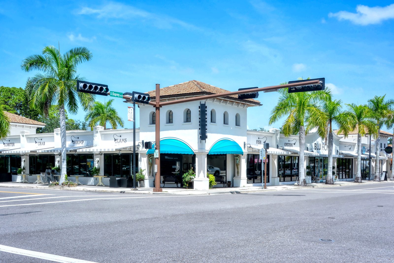 Boutique restaurants and shops at the corner of S Osprey Avenue and Hillview Street in Southside Village